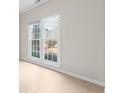 Bright living room with hardwood floors, illuminated by natural light at 2030 Brook Meadow Dr, Alpharetta, GA 30005
