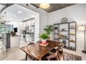 Bright dining area featuring modern decor adjacent to the kitchen at 855 Peachtree Ne St # 2309, Atlanta, GA 30308