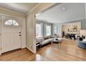 This bright open living room leads to a dining room area, great for entertaining at 1744 Chateau Dr, Dunwoody, GA 30338