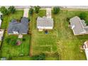 A sprawling backyard awaits in this suburban home with a large, grassy lawn at 2127 Grant Ave, Mcdonough, GA 30252
