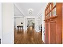 Inviting foyer with gleaming hardwood floors and elegant trim at 622 Rocky Creek Pt, Woodstock, GA 30188