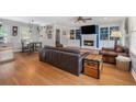 Inviting living room featuring hardwood floors, fireplace, and custom built-in shelving at 286 Indian Trl, Marietta, GA 30068