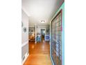 Inviting foyer with hardwood floors and a decorative glass paneled front door at 3530 Embry Circle Cir, Atlanta, GA 30341