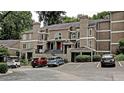 Attractive condo exterior with parking and beautiful architectural details at 36 Saint Claire Ne Ln, Atlanta, GA 30324
