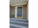 Inviting front entrance with a stylish door and manicured landscape at 36 Saint Claire Ne Ln, Atlanta, GA 30324