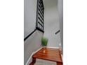 Interior stairwell with dark wood floors and decorative window at 36 Saint Claire Ne Ln, Atlanta, GA 30324