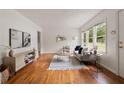 Bright living room with hardwood floors, neutral decor, and ample natural light at 2855 Monticello Pl, Decatur, GA 30030