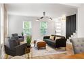Inviting living room with natural light, comfortable seating, and stylish decor at 126 Marona Ne St, Atlanta, GA 30307