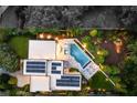 Aerial view of a modern home with solar panels and a private backyard pool at 1242 Wild Creek Ne Trl, Atlanta, GA 30324