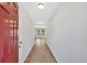 Bright entryway featuring stylish hard surface floors and neutral wall color at 3 Windsor Ct, Kingston, GA 30145