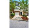Charming townhouse with siding exterior, front yard, and attached garage at 760 Celeste Sw Ln, Atlanta, GA 30331