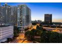 An impressive urban view, showcasing the building amid the cityscape at 215 Piedmont Ne Ave # 1001, Atlanta, GA 30308