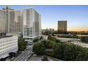 An urban view with tall buildings under a blue sky at 215 Piedmont Ne Ave # 1001, Atlanta, GA 30308