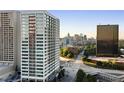 Cityscape view highlighting modern buildings and a road, creating an urban scene at 215 Piedmont Ne Ave # 2208, Atlanta, GA 30308