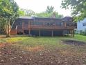 Large wooden deck and spacious backyard, perfect for outdoor entertaining and relaxation at 2413 N. Decatur Rd, Decatur, GA 30033
