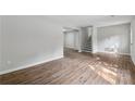 Spacious living area featuring hardwood floors and staircase at 3919 Valley Brook Rd, Snellville, GA 30039