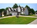 Beautiful two-story home with a manicured lawn, complemented by a two-car garage at 50 Worthington Dr, Villa Rica, GA 30180