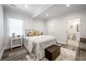 Cozy bedroom with neutral decor and hardwood floors, offering a serene retreat at 872 Beryl Sw St, Atlanta, GA 30310