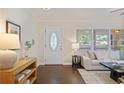 Bright entry featuring a decorative front door, hardwood floors, and an inviting atmosphere at 2383 Edgewater Sw Dr, Atlanta, GA 30311
