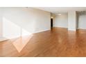 Bright and open living space showcasing shiny hardwood floors and neutral walls at 2479 Peachtree Ne Rd # 605, Atlanta, GA 30305