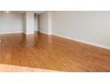 Spacious living area features shiny hardwood flooring and ample natural light at 2479 Peachtree Ne Rd # 605, Atlanta, GA 30305
