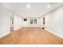 Bright living room features new wood flooring, fresh paint, and natural light at 2803 3Rd Sw Ave, Atlanta, GA 30315