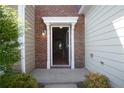Inviting front entrance with brick accents and classic white trim at 2426 Fairlie Dr, Duluth, GA 30096