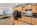 Well-equipped kitchen with granite countertops and stainless steel appliances at 3901 Old Atlanta Station Se Dr, Atlanta, GA 30339