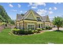 Charming single-Gathering home boasts beautiful landscaping and mature trees at 2855 Middlecreek Way # 2855, Cumming, GA 30041