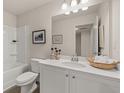 Well lit bathroom featuring a tub, vanity and mirror, offering a comforting appeal at 52 Leggett Dr # 185, Villa Rica, GA 30180