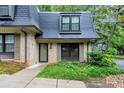Charming home featuring a well-manicured yard and a classic roof at 57 Cantey Nw Pl, Atlanta, GA 30327