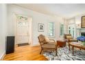 Inviting living room with hardwood floors, natural light, and a stylish geometric rug at 1821 N Rock Springs Ne Rd, Atlanta, GA 30324