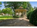 Community gazebo surrounded by trees and bushes at 828 Ivy Ne Cv, Norcross, GA 30071