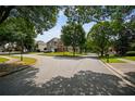 A street view showcases the well-maintained homes and lush greenery of this desirable neighborhood at 828 Ivy Ne Cv, Norcross, GA 30071