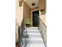 Inviting home entrance with a stairway and a stylish front door at 1252 Heritage Dr, Villa Rica, GA 30180