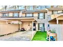 Charming townhome exterior with covered parking and updated fixtures at 4846 Twin Lakes Trl, Atlanta, GA 30360