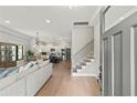 Bright and open foyer leading to a spacious living area, dining area, and a modern kitchen with stainless appliances at 1521 Sylvan Sw Rd, Atlanta, GA 30310