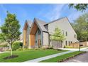 Beautiful home with modern architectural accents, pristine landscaping, and inviting curb appeal at 504 Barrington Drive, Roswell, GA 30075