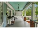 Spacious front porch with ample seating, perfect for enjoying the outdoors at 1038 Saint Charles Ave, Atlanta, GA 30306