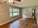 Sunlit living room featuring hardwood floors and neutral walls at 1468 Spruce Se Dr, Smyrna, GA 30080
