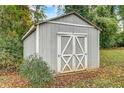 This property includes a functional outdoor shed for extra storage at 1101 White Oak Ave, Atlanta, GA 30310