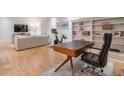 Basement area featuring desk, chair, and shelving at 235 Founders Mill Ct, Roswell, GA 30075