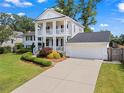 Beautiful two-story home with a well-maintained lawn, attached garage, and inviting front entrance, perfect for families at 1429 Noel Ne Dr, Brookhaven, GA 30319