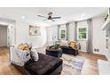 Bright and inviting living room with natural light, modern furnishings, and stylish decor at 4430 Lamar Dr, Douglasville, GA 30134
