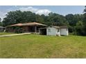 Home with a generous yard and additional structure in back at 547 Morningside Dr, Lawrenceville, GA 30043