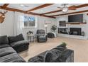 Inviting living room with hardwood floors, a cozy fireplace, and neutral decor for comfortable living at 4739 Lower Jersey Rd, Oxford, GA 30054