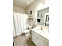 Bright bathroom featuring a shower/tub, white vanity, neutral paint, and tile floors at 776 Woodstock Grove Dr, Woodstock, GA 30188