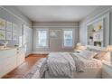 Cozy bedroom with hardwood floors, ample natural light, and stylish decor at 1453 Graham Sw St, Atlanta, GA 30310