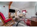 Cozy living room featuring a stone fireplace and inviting decor at 842 Third St, Stone Mountain, GA 30083