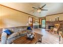 Inviting living room featuring a brick fireplace and comfortable seating at 2863 Jordan Forest Trl, Lawrenceville, GA 30044